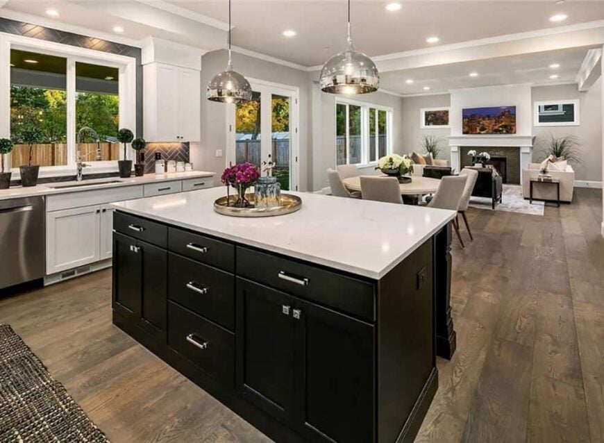 The kitchen island has a great view of the breakfast nook and a great room.