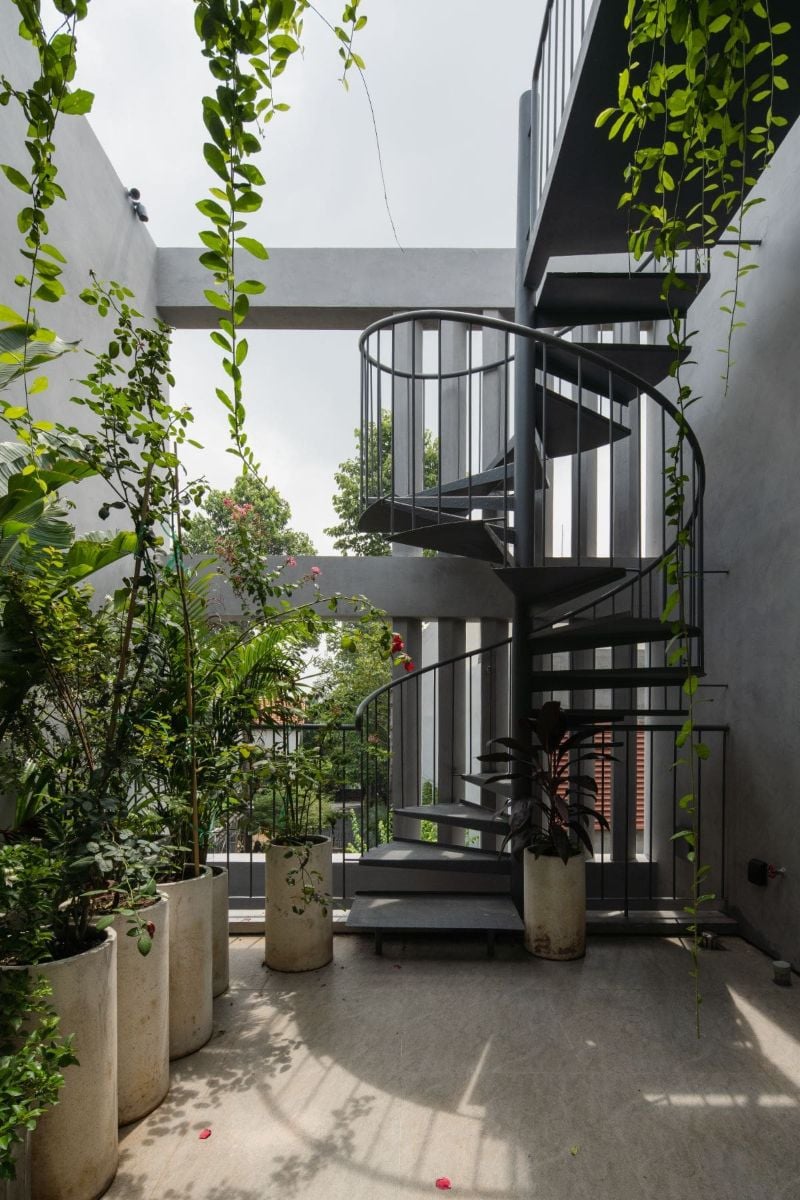 The spiral steel stairs from the ground floor leading to the third floor.