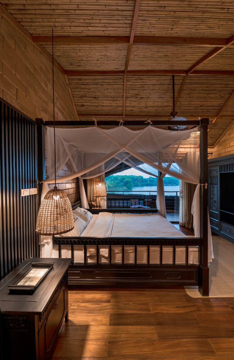 The master bedroom wit peculiar shaped balcony accentuated the view of the lake.