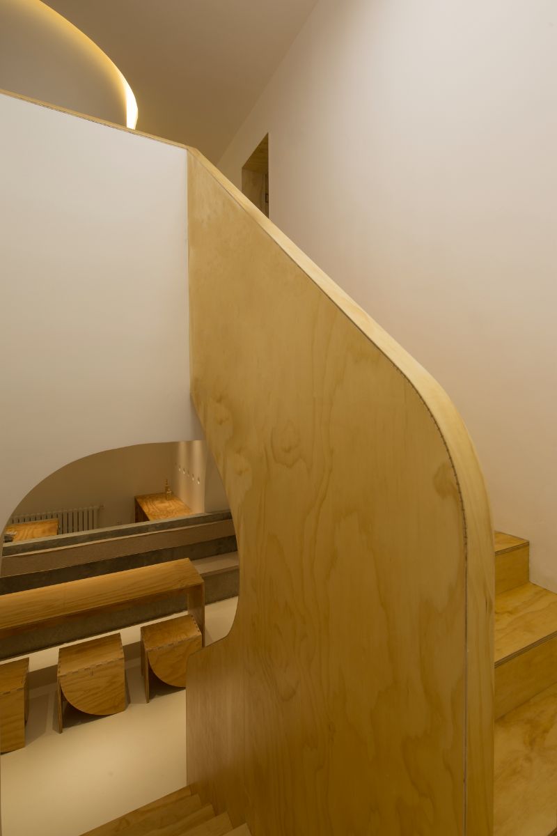 The stairs are made of hardwood.