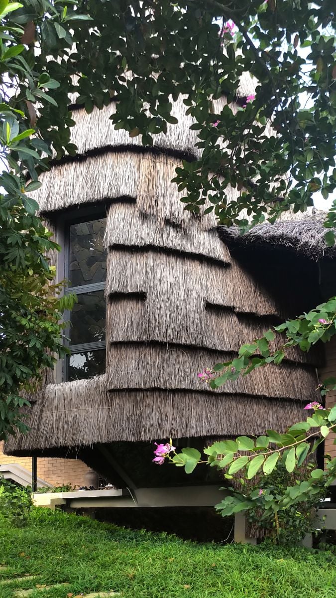 An outside staircase reminiscent of a rice straw stack.