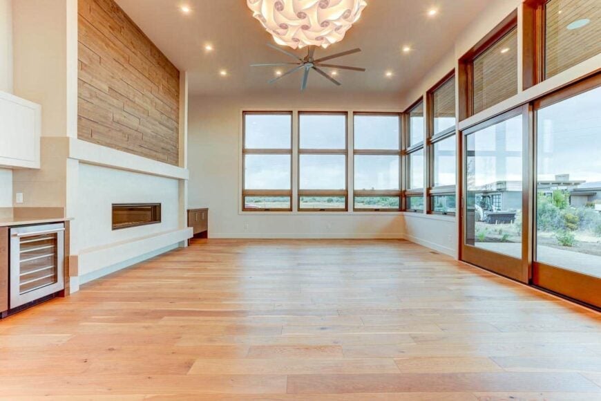 Large corner windows and sliding glass doors bring in an abundant amount of natural light.