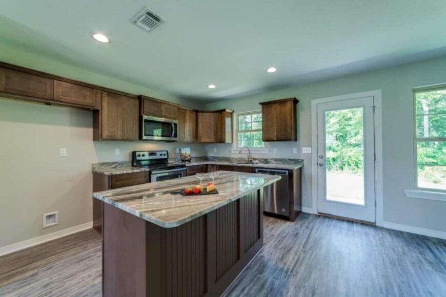A glazed door off the kitchen leads to an open patio.