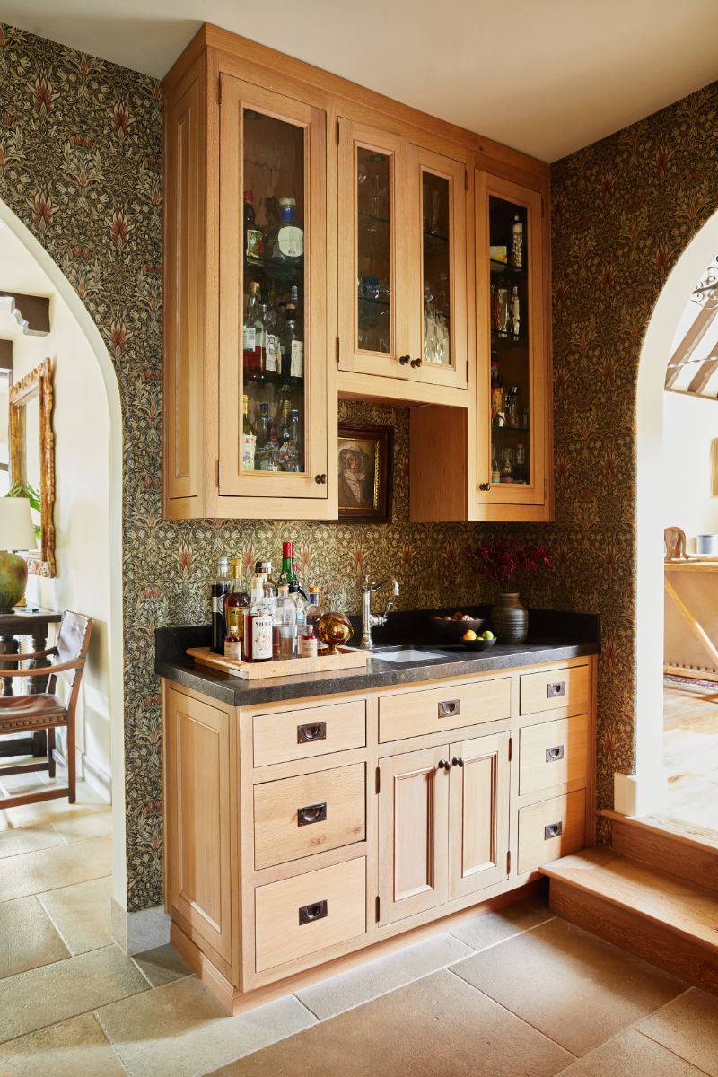 The kitchen cabinetry and wine storage area. Image courtesy of Toptenrealestatedeals.com