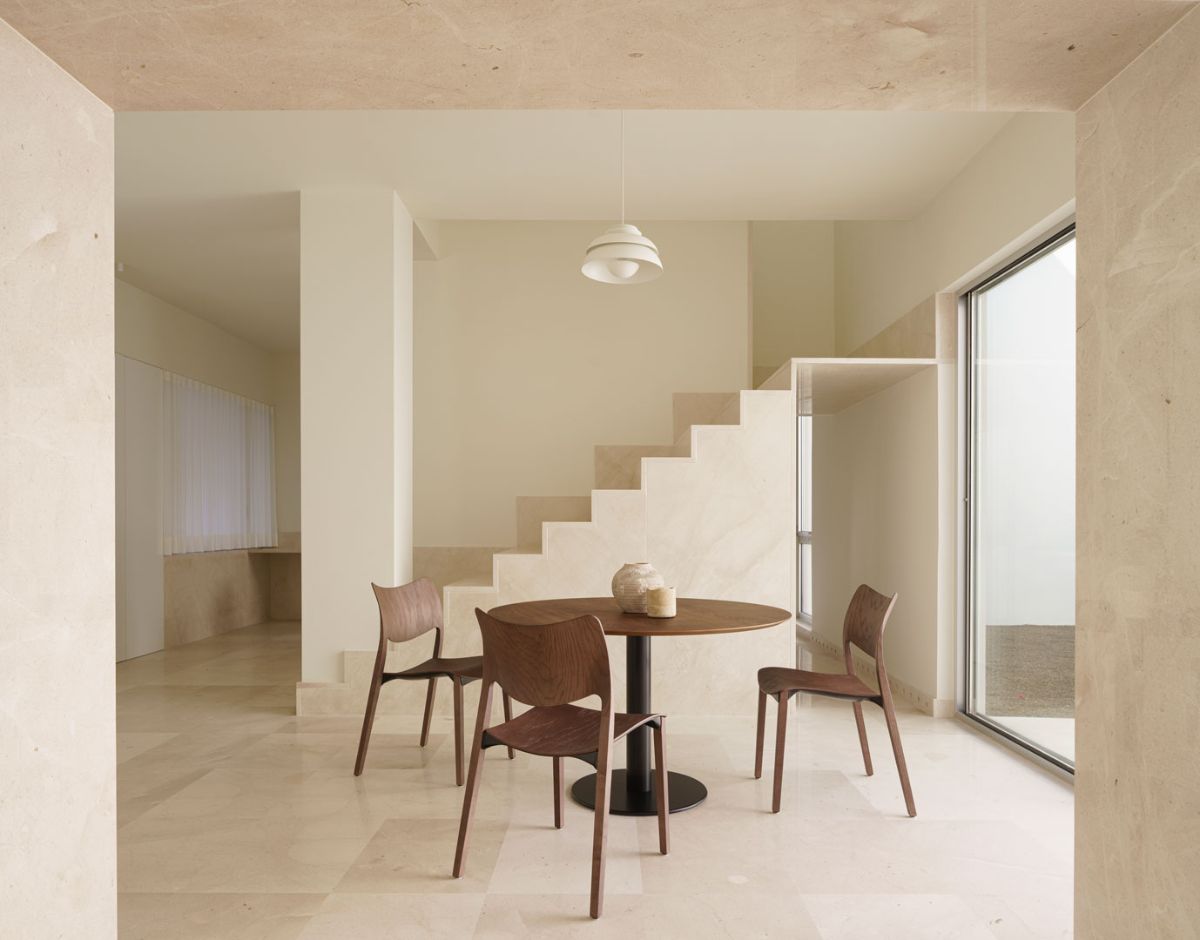 The dining area connected to the core of the staircase.