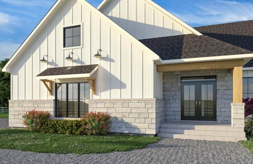 The home entry has a concrete stoop, a french front door, and a sole tapered column with a brick base.