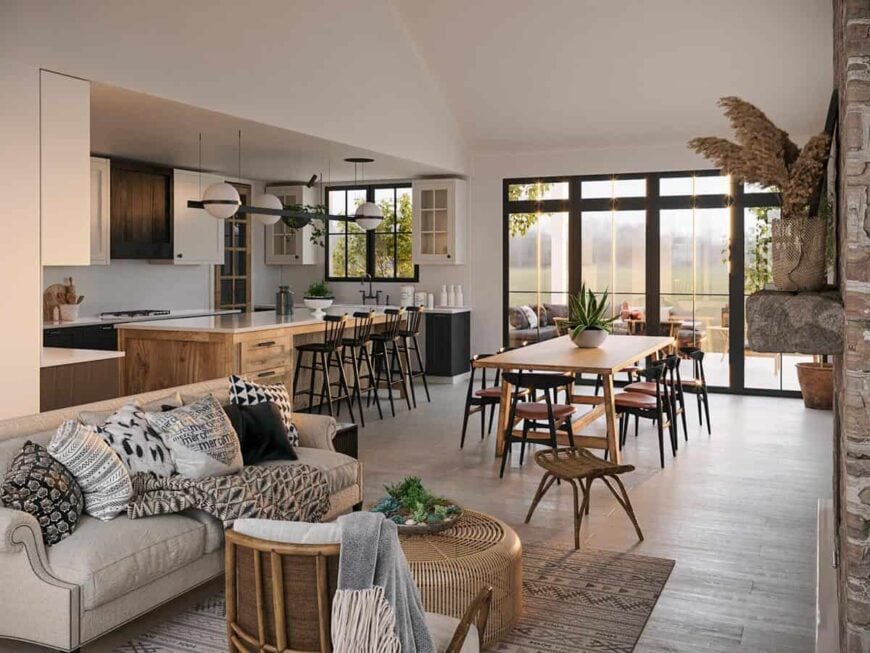 An open layout view of the living room, dining area, and gourmet kitchen.