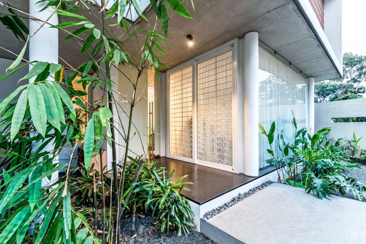 The main entrance that features the Kota stone flooring and concrete ceiling.