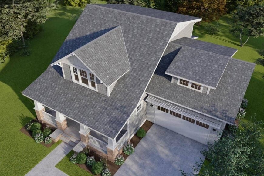 Aerial view of the house showcasing its large dormers, covered porch, and front-entry garage.Aerial view of the house showcasing its large dormers, covered porch, and front-entry garage.