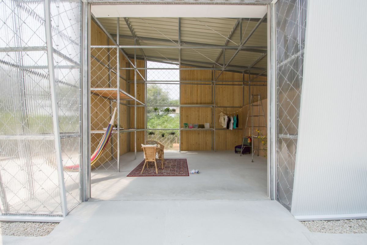 The inside space of the house with a storage space for materials.