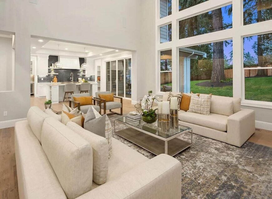 Massive windows on one side of the wall flood the great room with natural light.