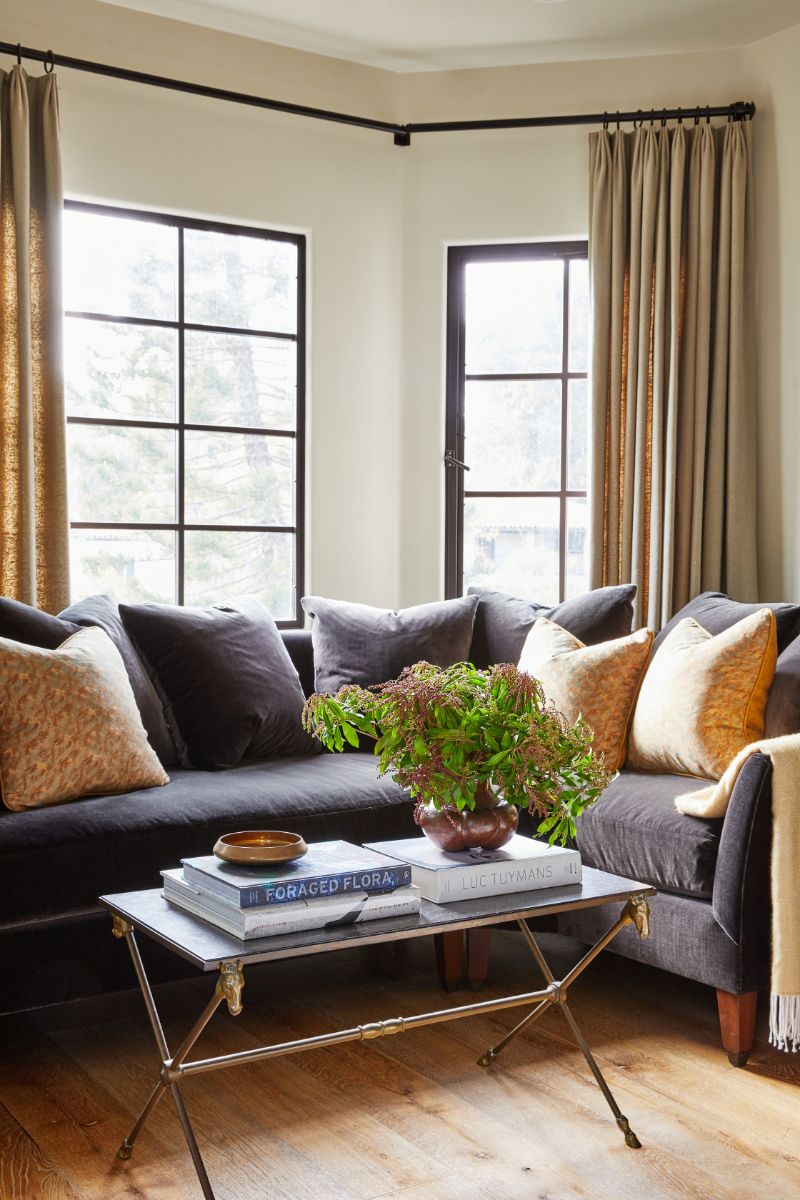 The formal living room with big windows looking out onto the garden. Image courtesy of Toptenrealestatedeals.com
