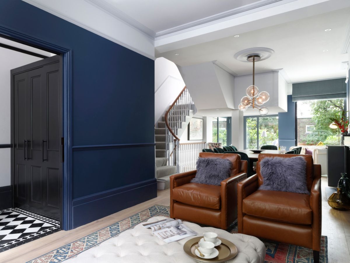 The living area that is connected to boot room and formal dining area.