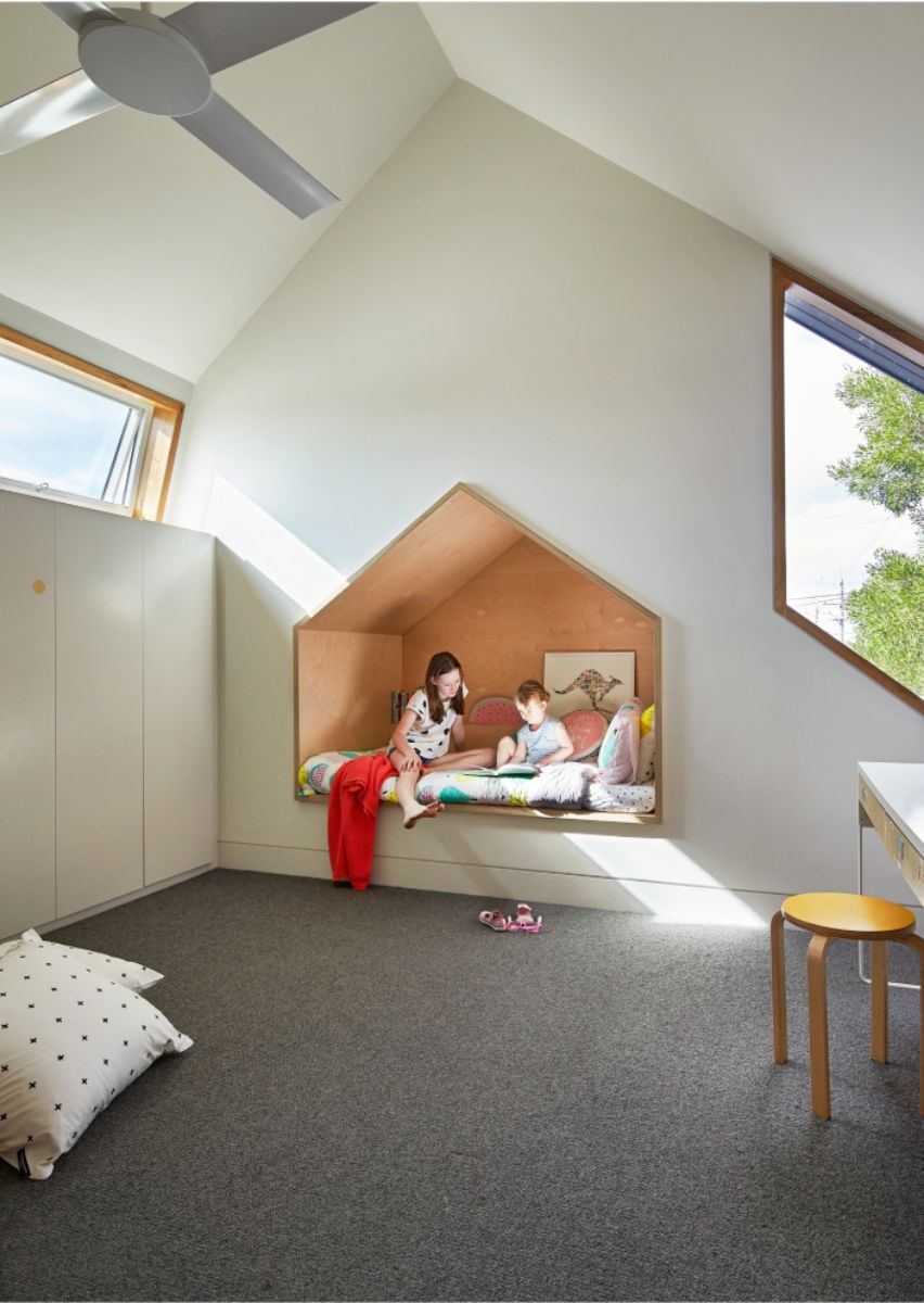 The kids bedroom as the extension design with large glass windows,.
