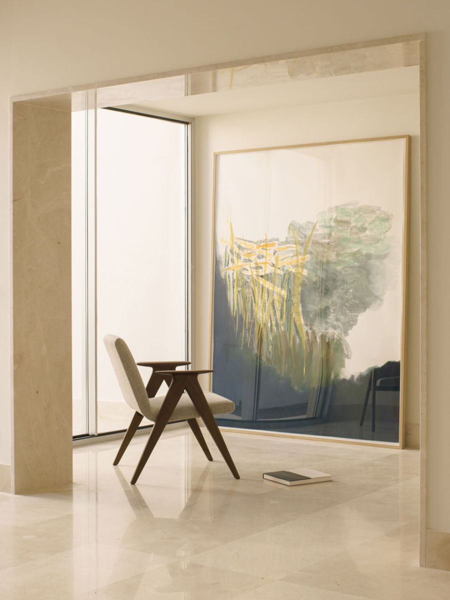 A private reading area which facing the large glass window to view the courtyard.