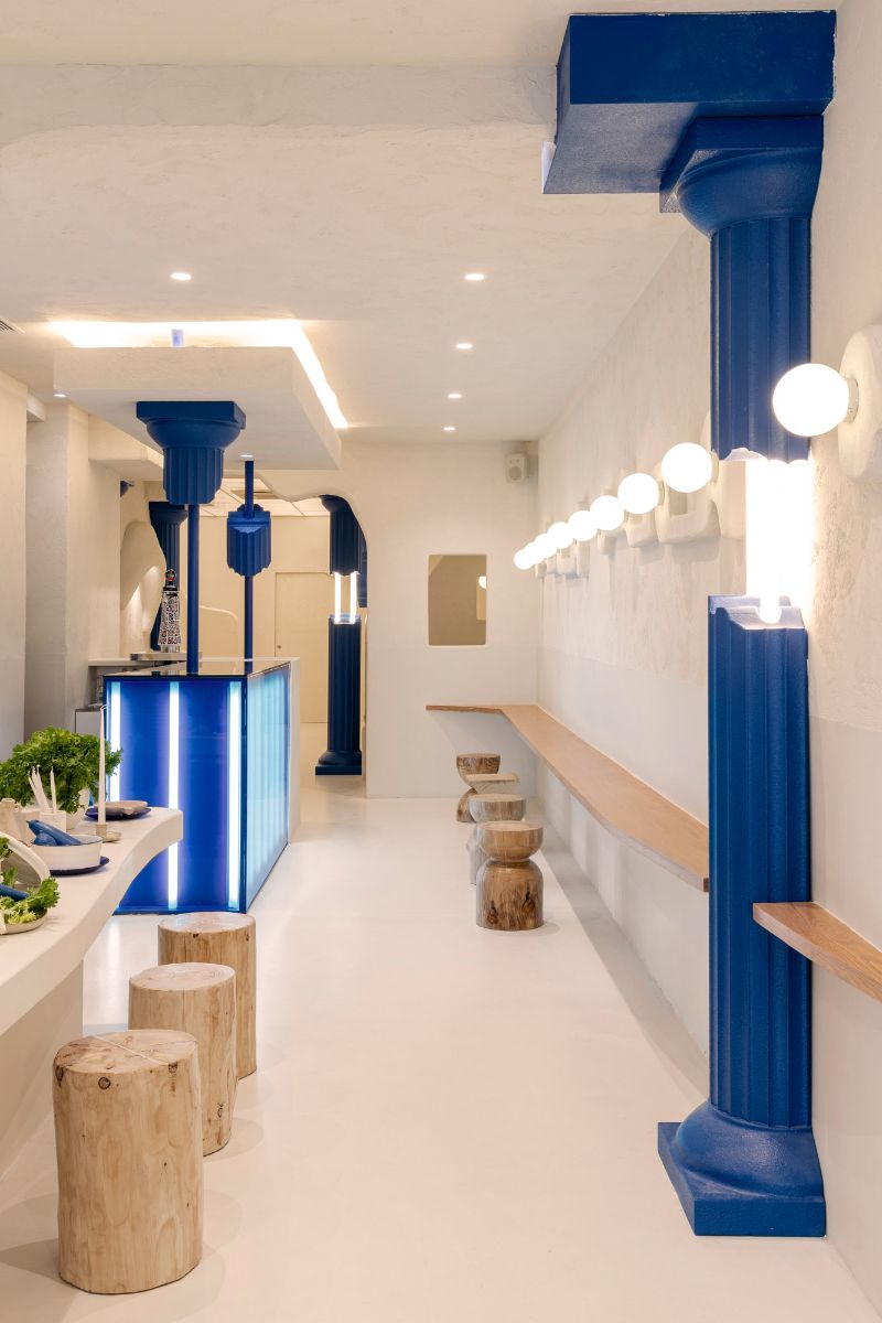 The restaurant counter area that features a coloured electric blue.