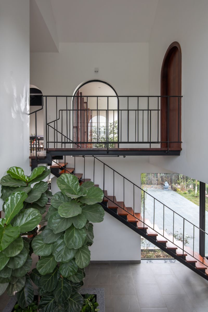 Incorporating the kitchen into the atrium also creates a vertical connection with the 2 bedrooms upstairs.