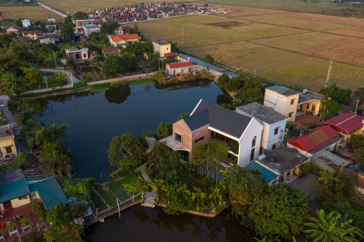 An aerial view of the house located in the lake area.