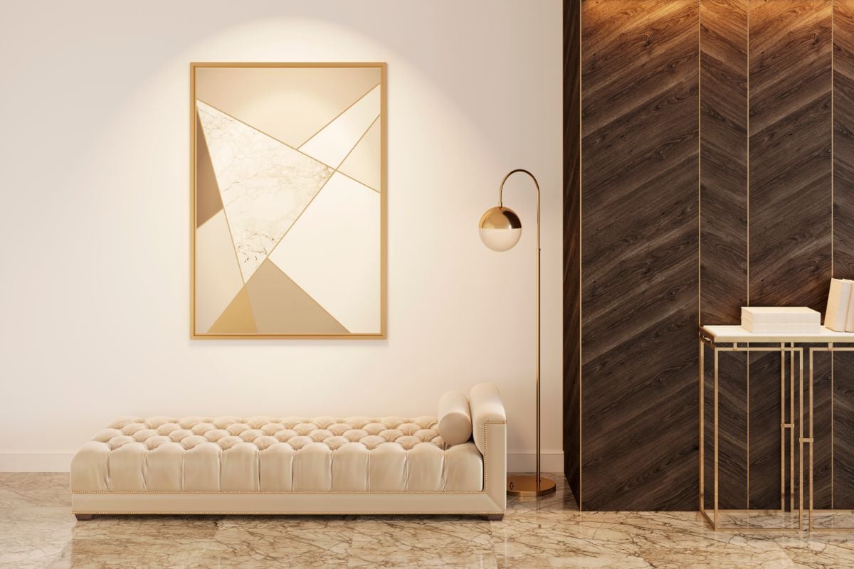 A daybed and an abstract wall painting.