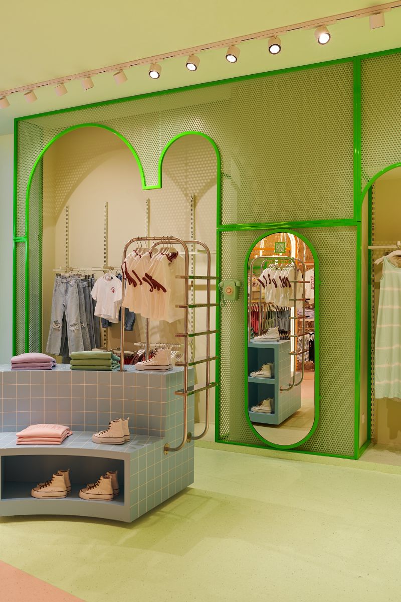 The shelves and racks of the store with mirror.