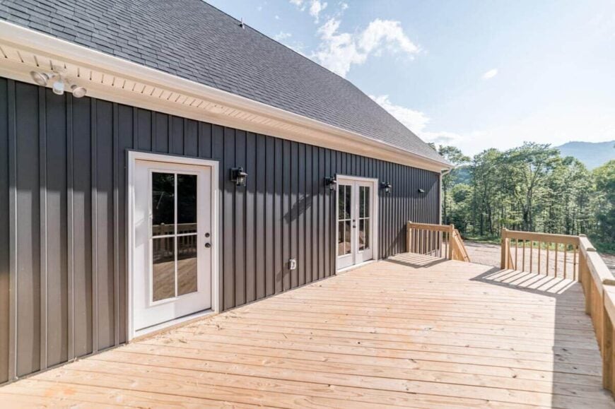 Tinted glass doors of the laundry and dining room lead to the sun deck.