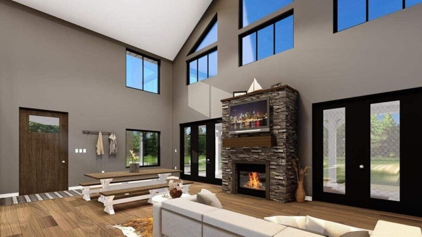 Two sets of french doors extend the living space onto the covered porch.