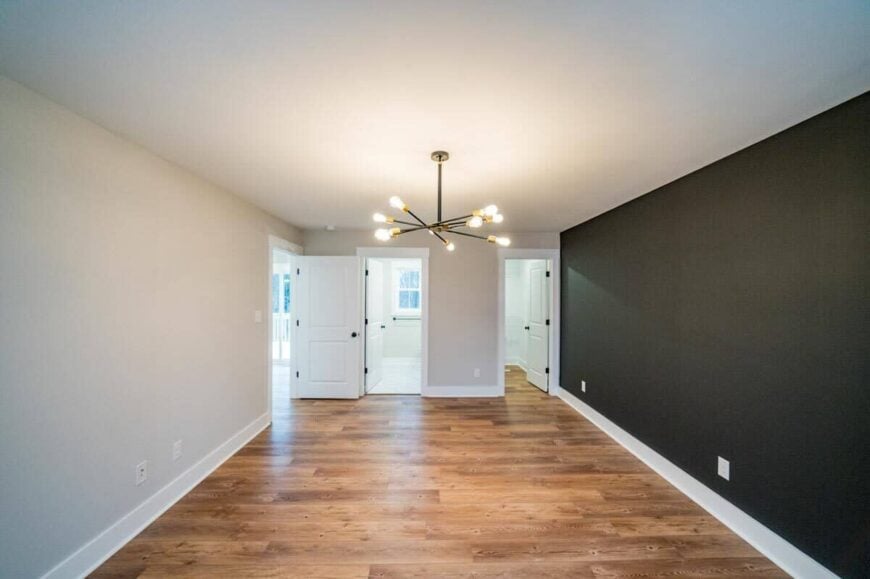 The primary bedroom includes a walk-in shower and a private bathroom.
