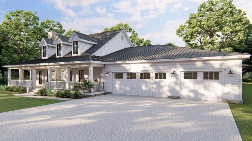 Front rendering with a covered entry porch and an oversized 3-car garage complemented with a concrete driveway.