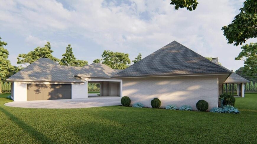 Right rendering with porte-cochere and garages separated by a motor court.