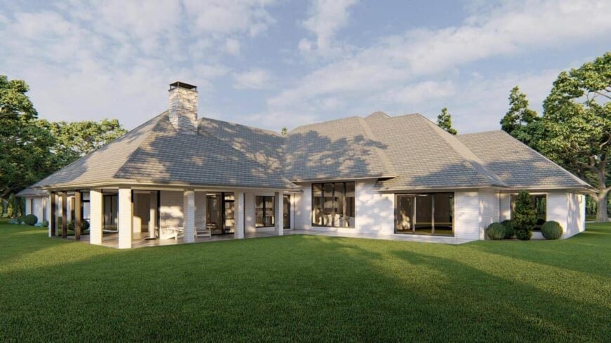 Large brick columns surround the covered back porch.