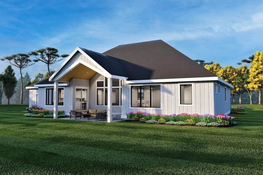 Rear rendering with vertical siding and a covered porch topped with a gable roof