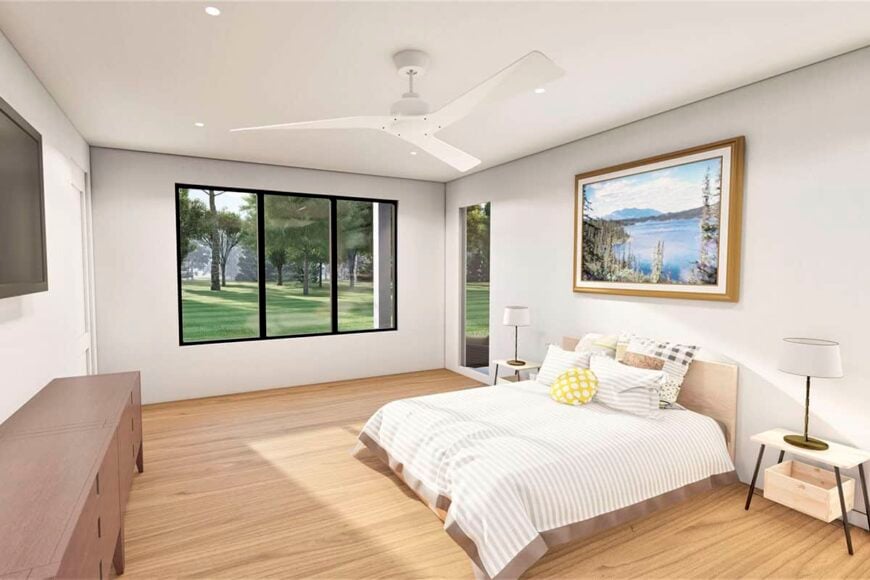 The primary bedroom has a hardwood floor and outdoor access via a glazed door.