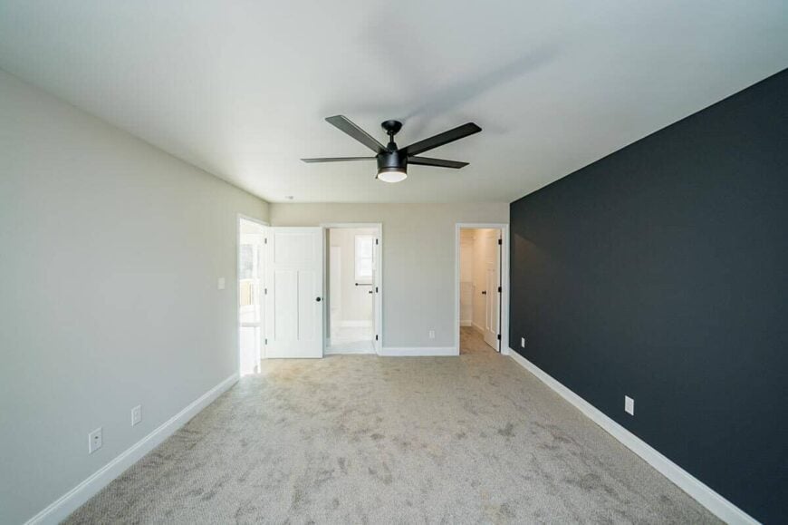 The primary bedroom includes a walk-in closet and a private bathroom.