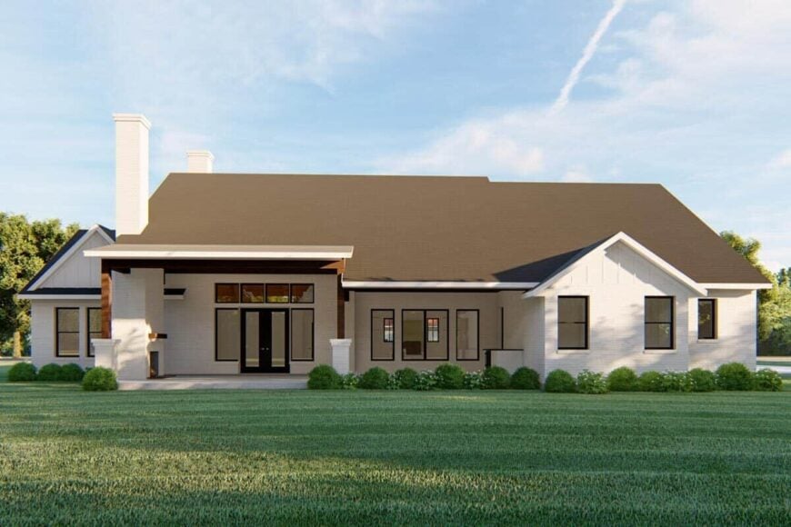 Rear rendering with covered porches filled with a summer kitchen and an outdoor fireplace.