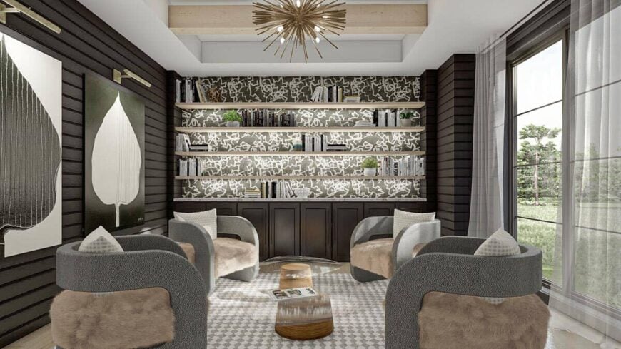 Library with built-in bookshelves and unique round-back armchairs paired with a glass-top coffee table.