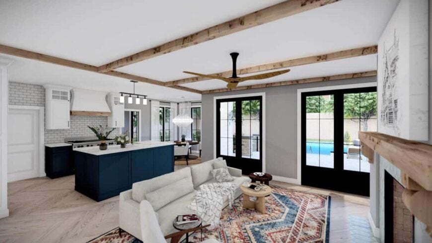 Two sets of french doors extend the great room onto the back porch.