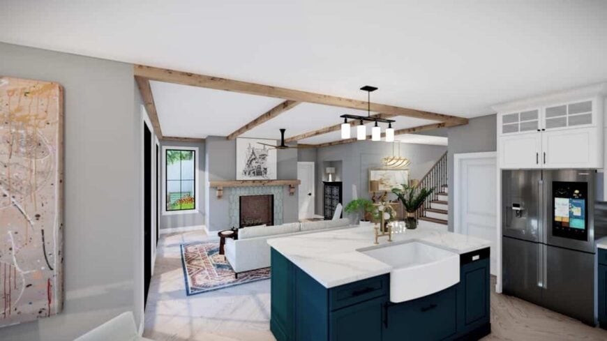 The kitchen with a farmhouse sink fitted on the marble-top island overlooks the great room.