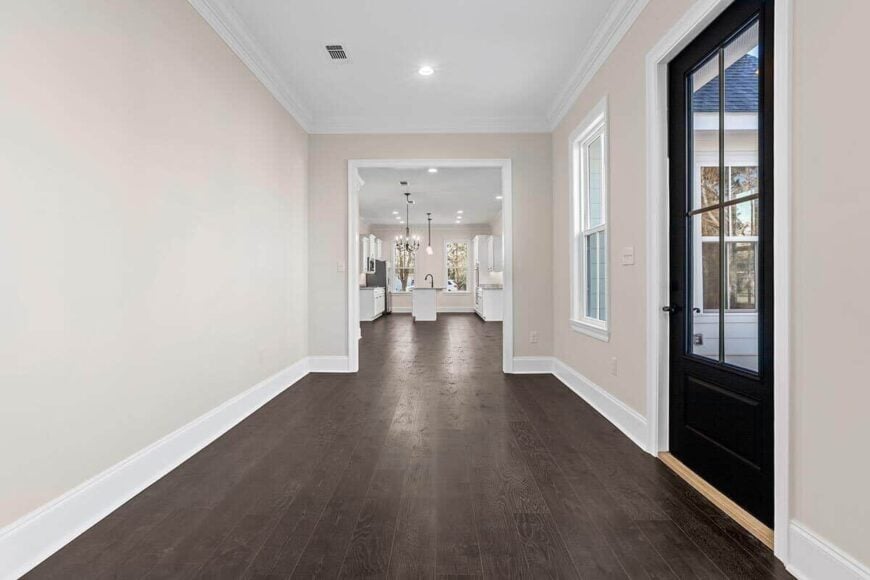 The sunroom has direct outdoor access and a great view of the kitchen.