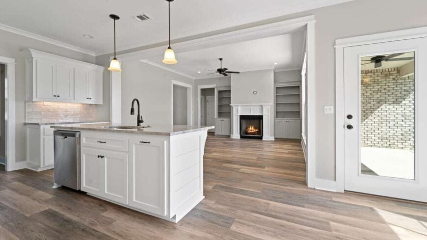 View of the kitchen and great room from the dining area.