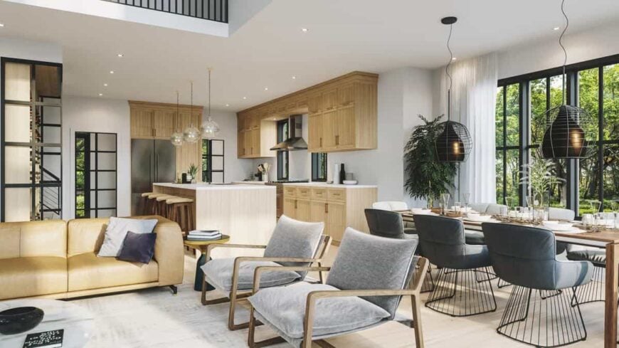 An open layout view of the living room, kitchen, and bright dining area.