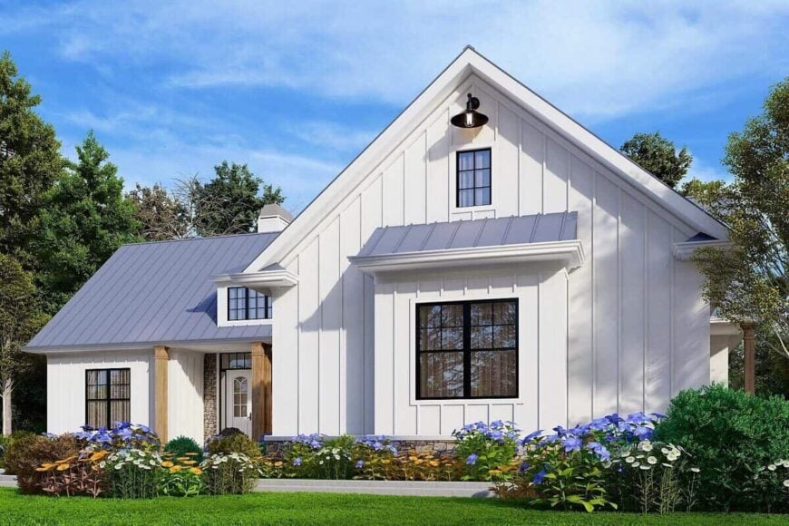 Front rendering with board and batten siding, metal roofs, and large windows.
