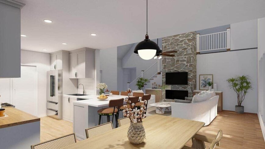 Dining area with a wooden dining set and unobstructed views of the kitchen and great room.