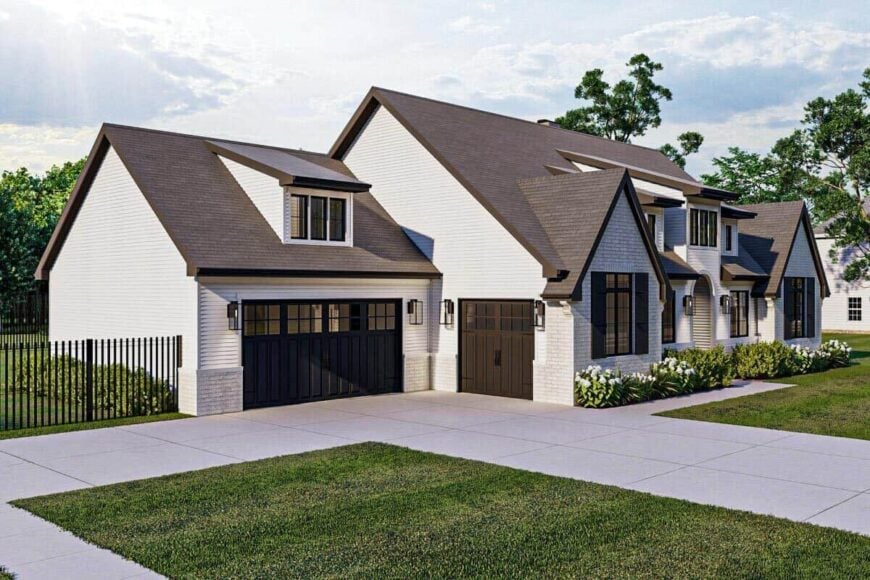 Front-left rendering with brick and siding, and a shed dormer over the garage.