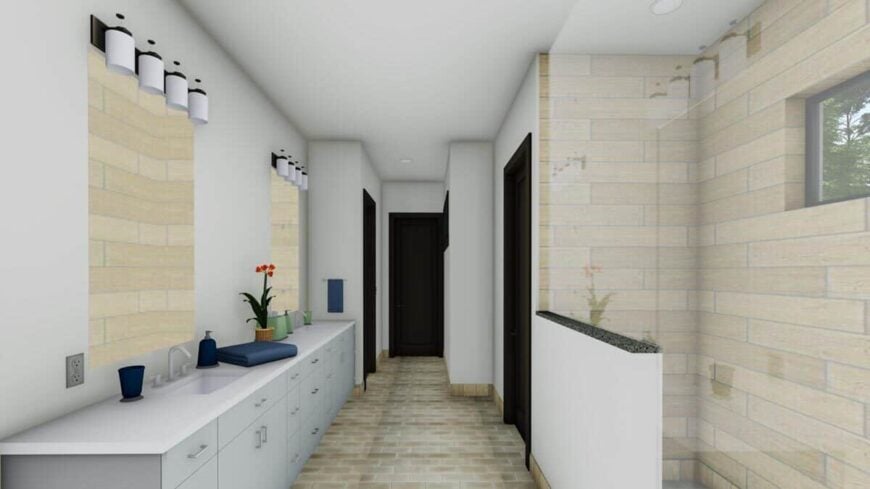 Primary bathroom with a lengthy vanity and a walk-in shower highlighted by linear brick tiles.