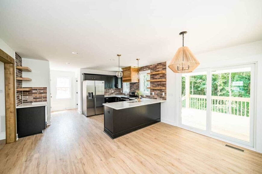 Sliding glass doors off the dining area open to a covered deck.