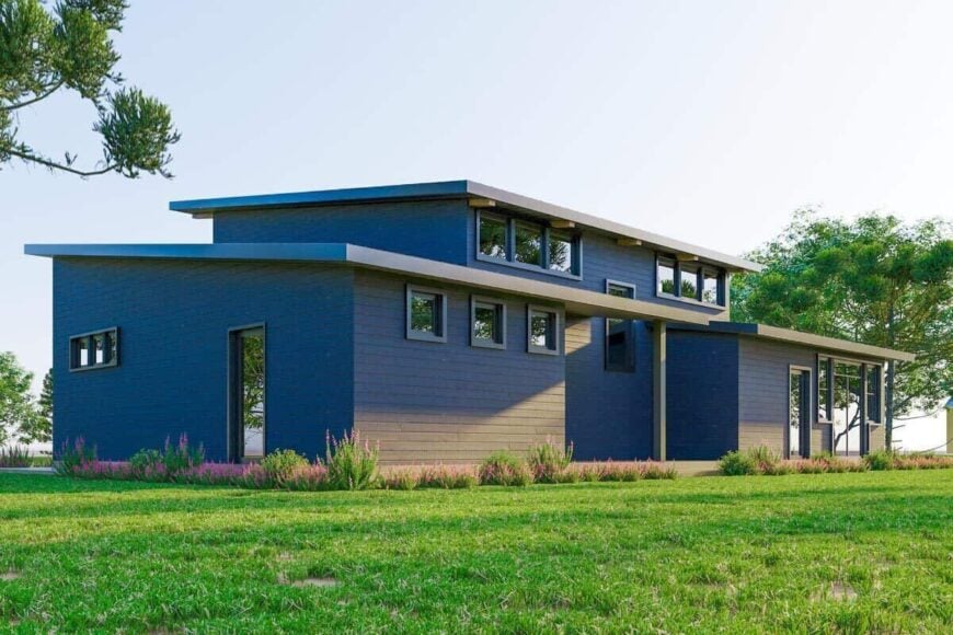An angled view shows the slanted rooflines and a side entry.