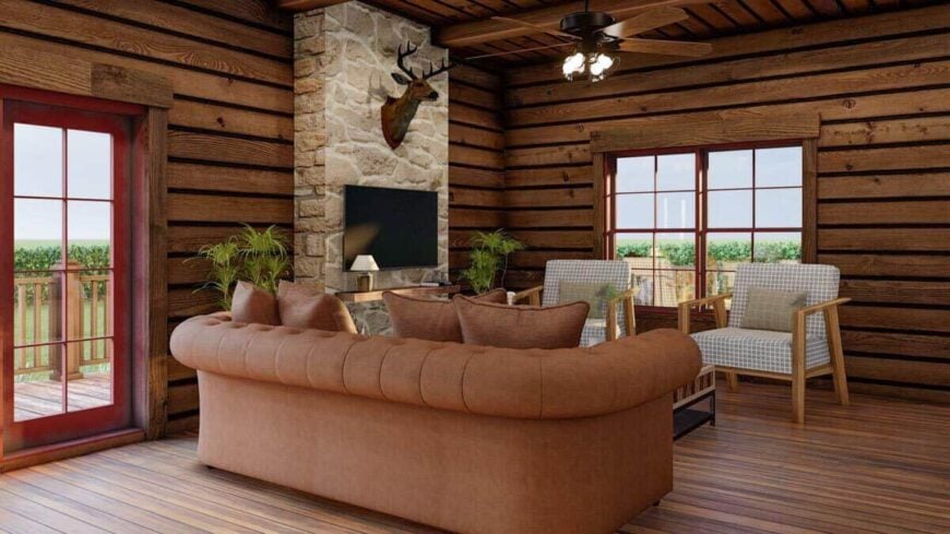 Large windows and glazed doors invite an abundant amount of natural light into the living space.