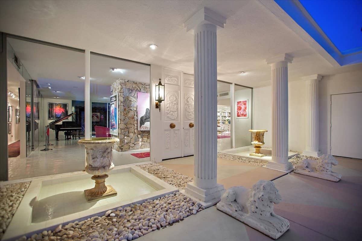 Decorative columns and goblets add character to the house. Image courtesy of Toptenrealestatedeals.com.