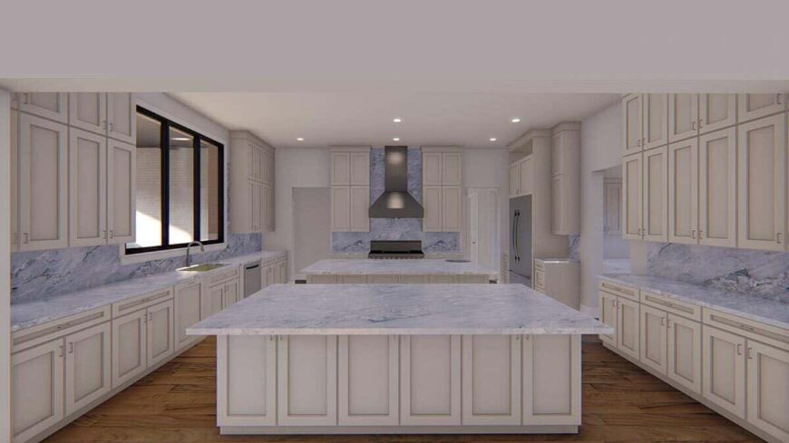 The kitchen offers ample storage, marble countertops, and multiple islands providing tons of workspace.