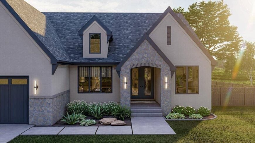 The covered entry porch has a french front door and a concrete stoop.
